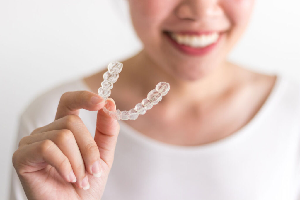 adult patient choosing Invisalign for discreet orthodontics