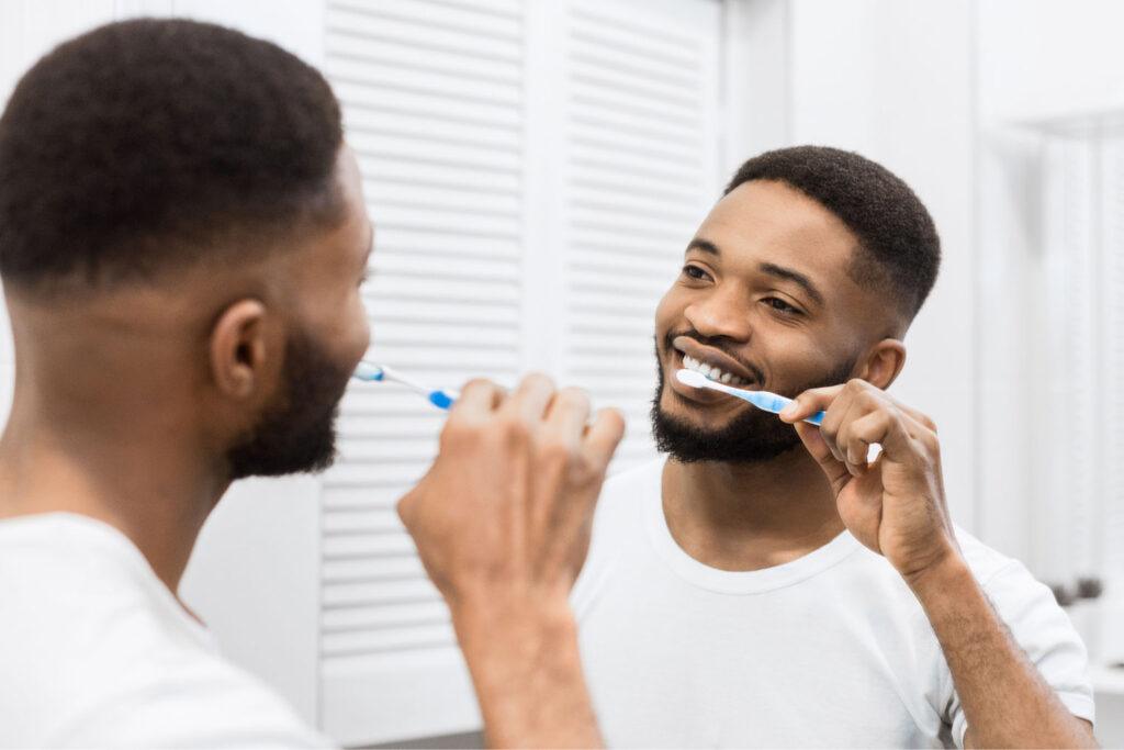 
patient learning proper brushing for gum disease prevention
