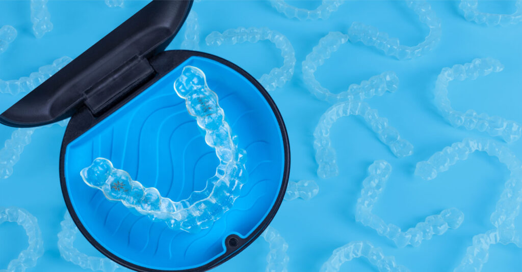closeup of clear Invisalign aligners