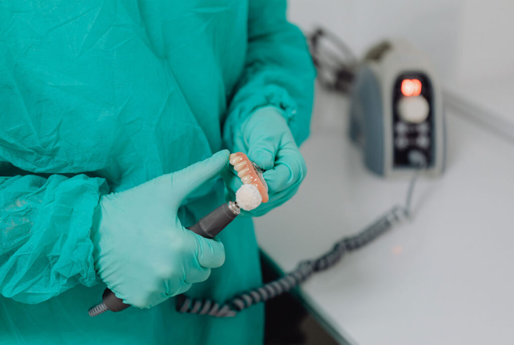 removable partial denture with metal clasps on model