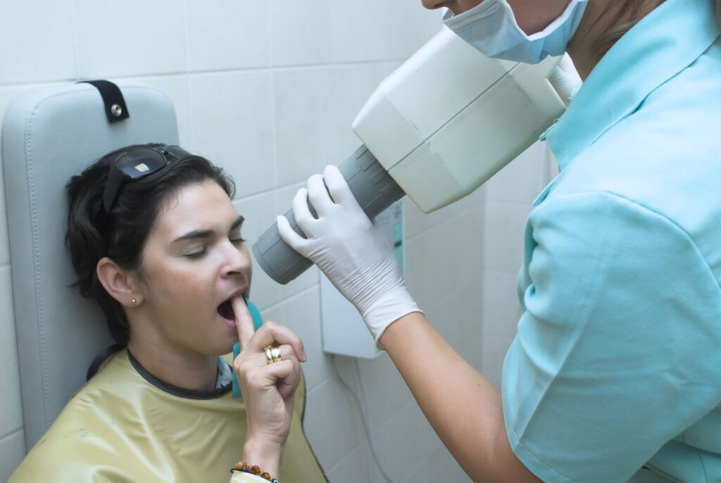 patient discussing x-ray with dentist