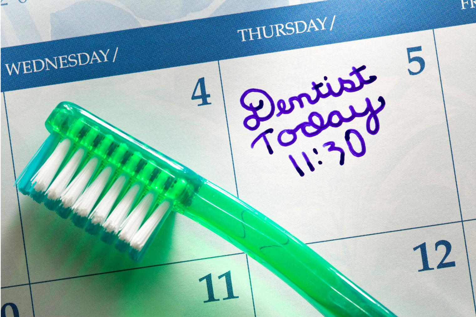 toothbrush and fluoride toothpaste for a consistent home care routine
