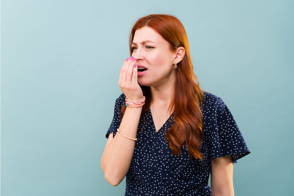 bad breath causes bacteria buildup on tongue and teeth