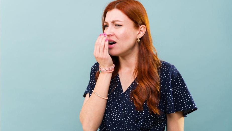 bad breath causes bacteria buildup on tongue and teeth