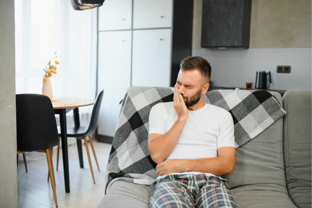 Cracked tooth showing why cold and biting can trigger sudden pain