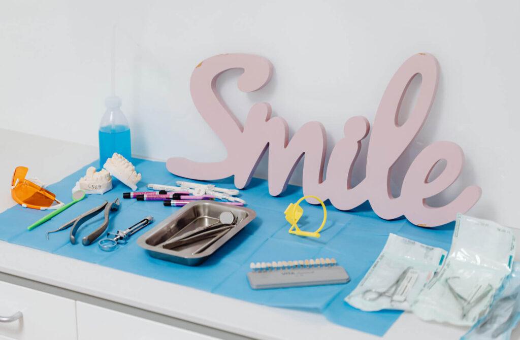 holding cheek with mild tooth sensitivity after whitening