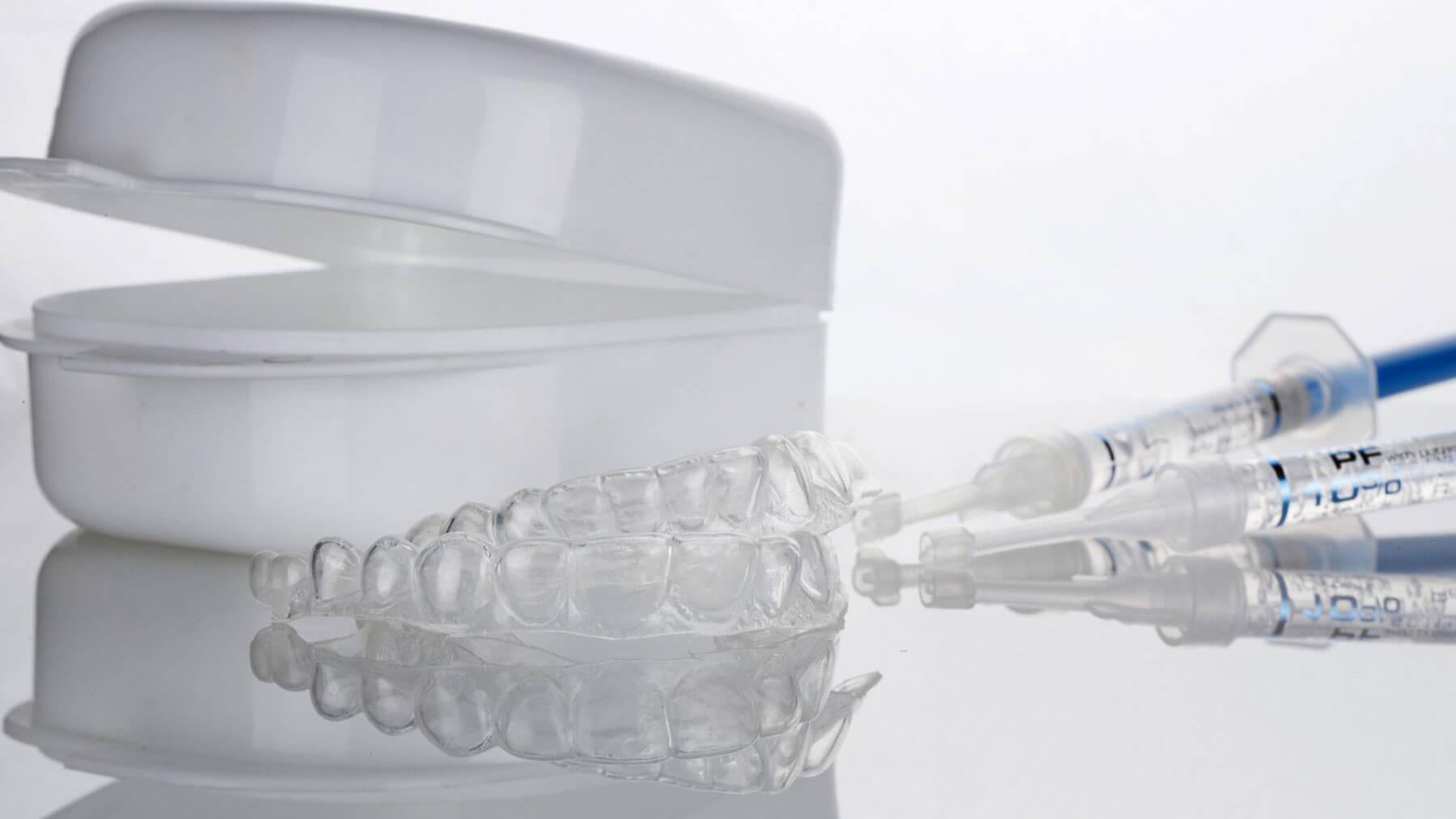 Antimicrobial mouthwash and floss displayed as part of an oral hygiene routine nad preventive tartar