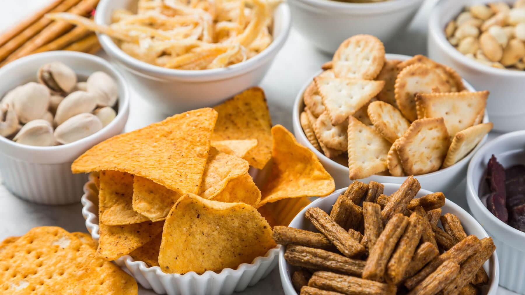 Foods to avoid after wisdom teeth removal: popcorn, chips, and nuts