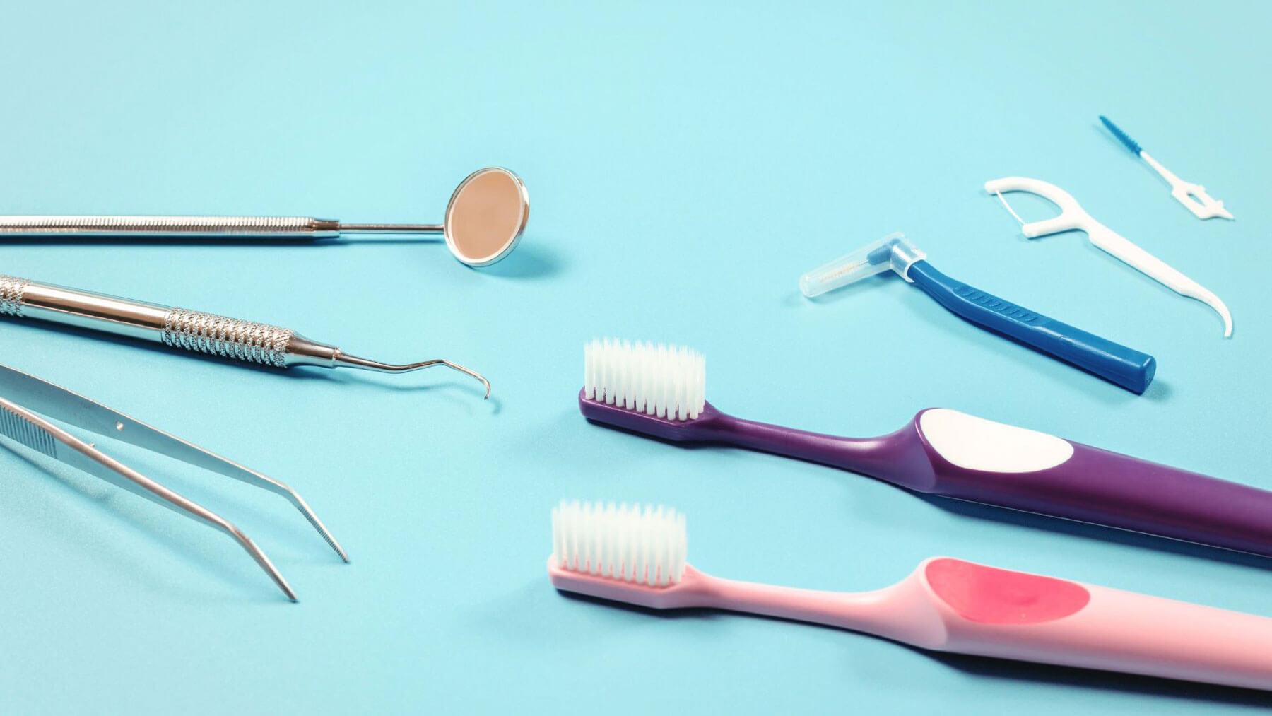 Soft-bristled toothbrush and floss used for daily plaque control at home and prevent tartar