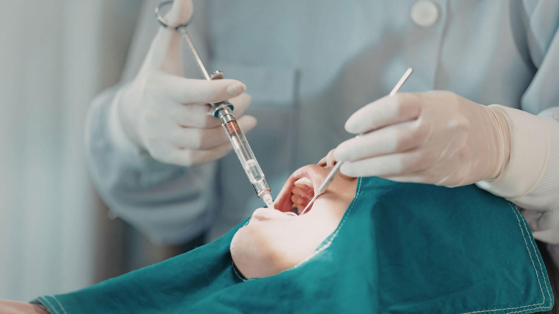 Patient seated for wisdom teeth removal consultation in Carlsbad dental office